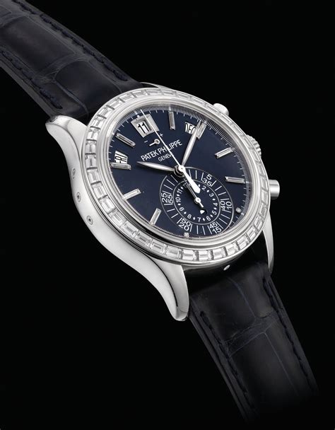 PATEK PHILIPPE. A VERY FINE AND VERY RARE PLATINUM .